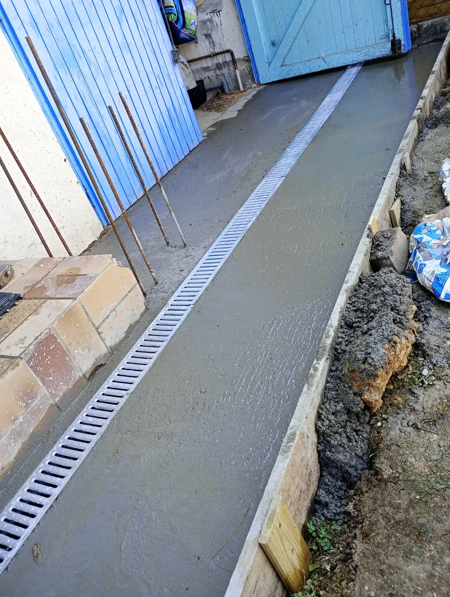 Travaux sur la dalle et le muret extérieur
